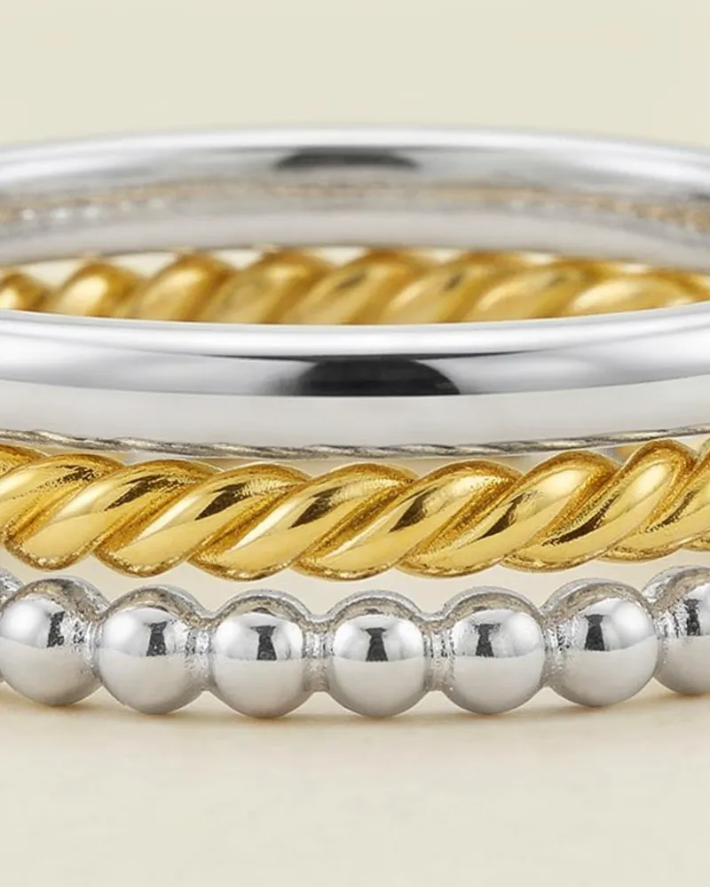 Close-up of the Aurelia Stacking Ring Set in Mixed Metal: set of three 1.5mm bands
