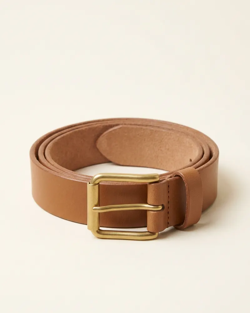 Brass-Buckle Leather Belt in Tan: a 3cm vegetable-tanned leather belt with a solid brass roller buckle