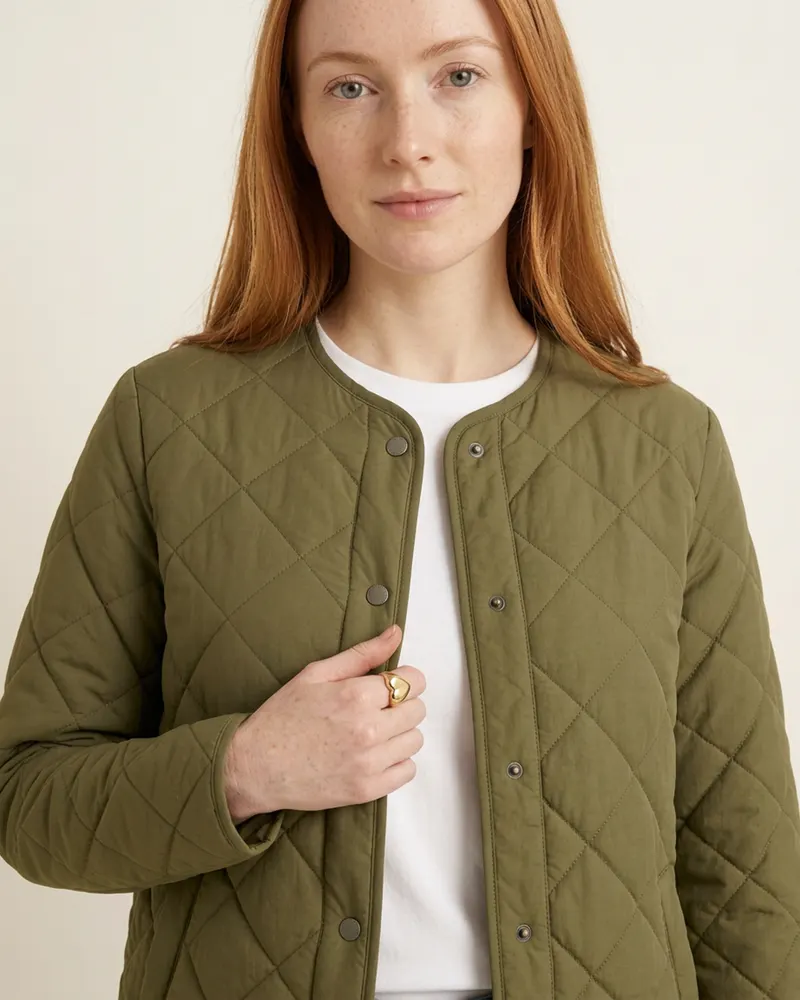 Close-up of the Diamond-Quilted Jacket in Olive: diamond quilting