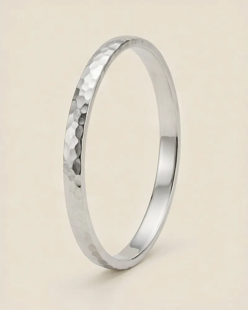 Hammered Oval Bangle in Recycled Silver: a solid 4mm oval bangle with a hand-hammered finish