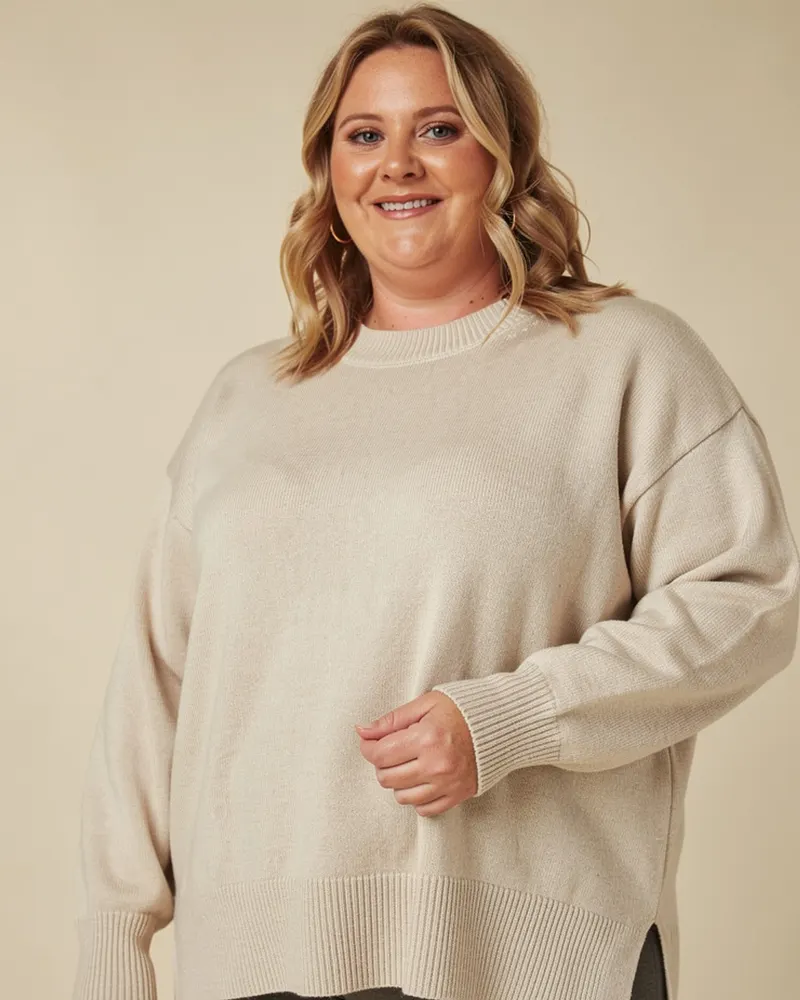 Close-up of the Knitted Lounge Jumper in Oatmeal: merino-cotton knit