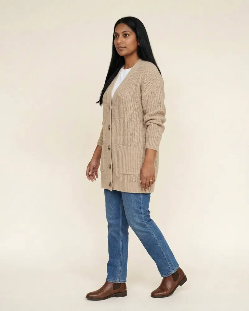 Mabel Chunky Wool Cardigan in Oatmeal, three-quarter view showing the drape