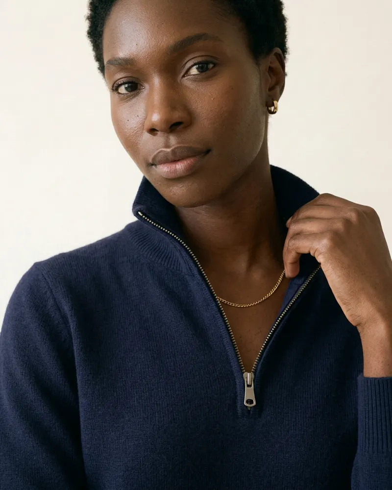 Close-up of the Merino Half-Zip Jumper in Navy: stand collar with half zip