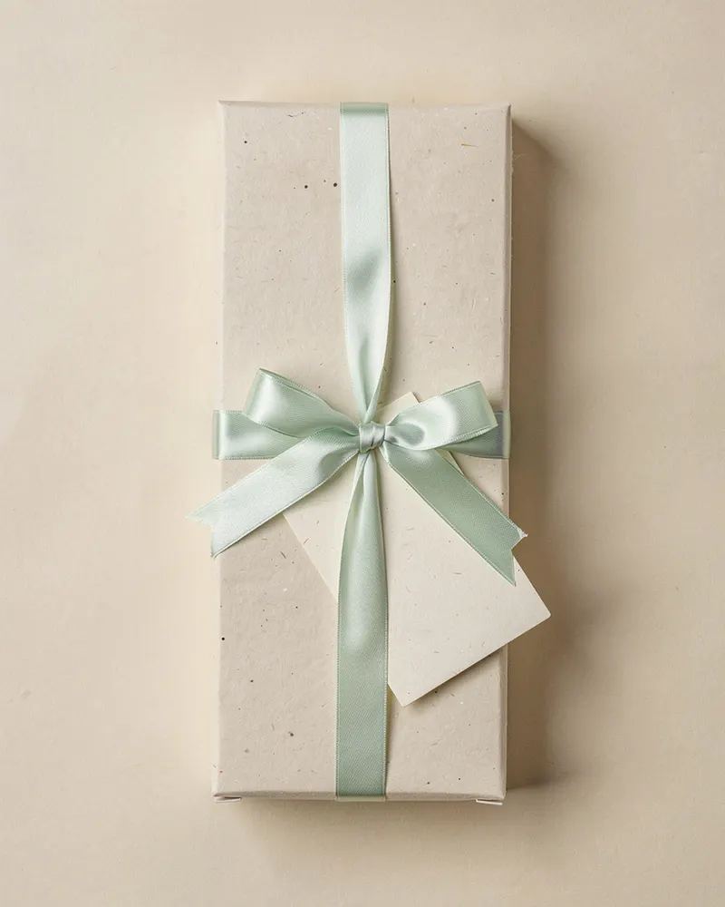 Northlight Eau de Parfum gift-wrapped with a handwritten message card