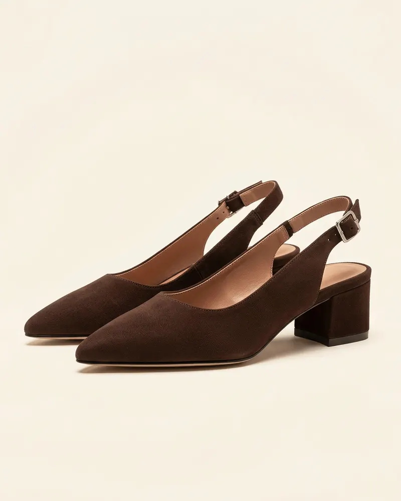 Odette Block-Heel Slingback in Chocolate Suede, a pair shown at three-quarters: pointed-toe slingback shoes on a 5cm block heel with a buckled ankle strap