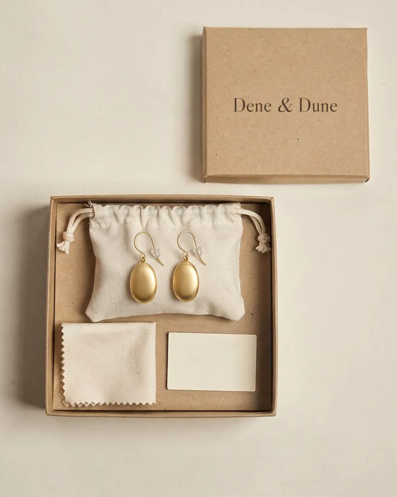 Pebble Drop Earrings in Gold Vermeil in its Dene & Dune gift box with pouch and care card